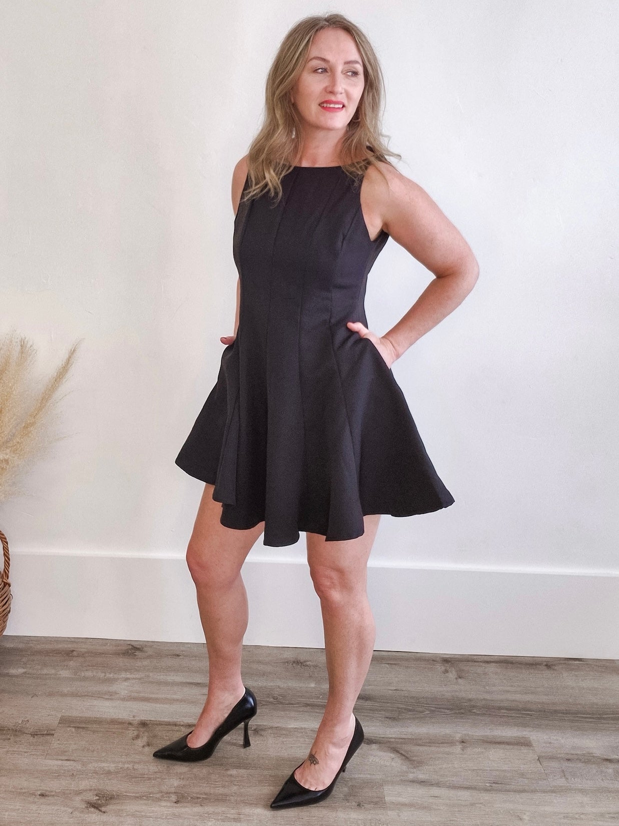 Sleeveless Flared Hemline Dress - Black-Special Occasion Dress- Hometown Style HTS, women's in store and online boutique located in Ingersoll, Ontario