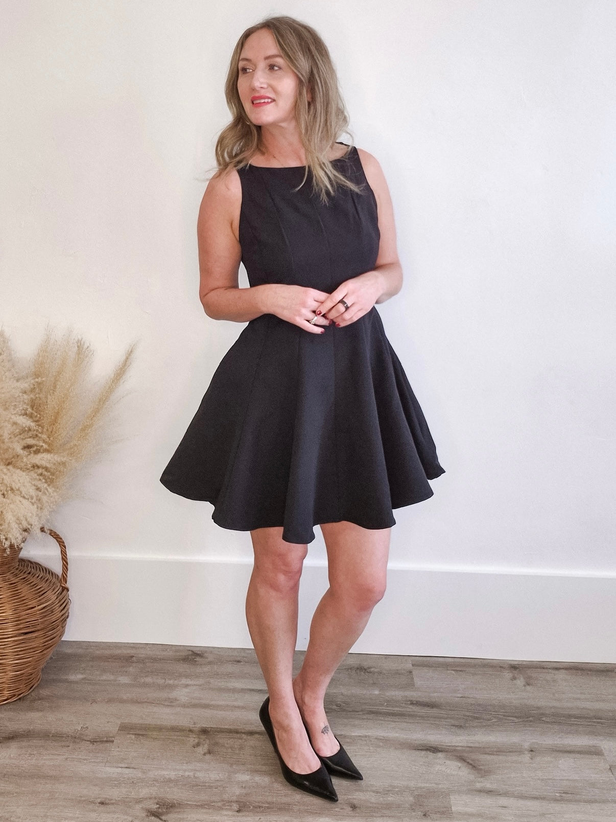 Sleeveless Flared Hemline Dress - Black-Special Occasion Dress- Hometown Style HTS, women's in store and online boutique located in Ingersoll, Ontario