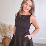 Sleeveless Flared Hemline Dress - Black-Special Occasion Dress- Hometown Style HTS, women's in store and online boutique located in Ingersoll, Ontario