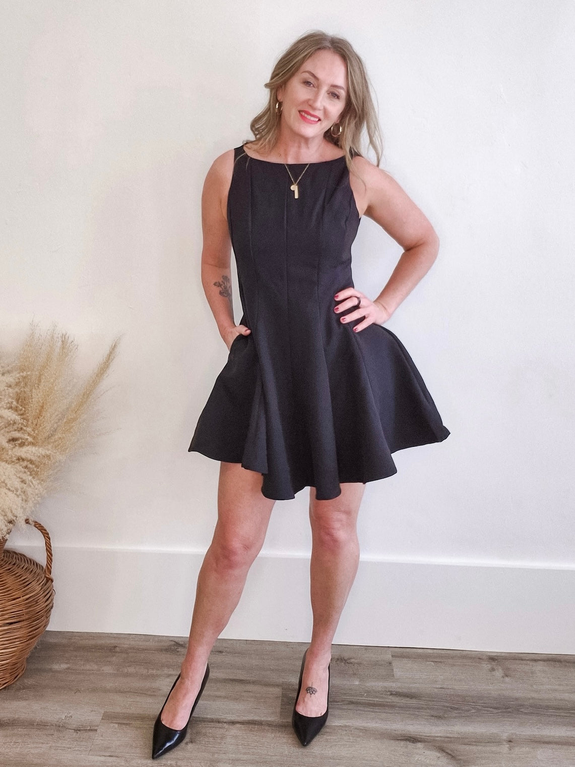 Sleeveless Flared Hemline Dress - Black-Special Occasion Dress- Hometown Style HTS, women's in store and online boutique located in Ingersoll, Ontario